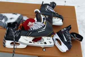 Mine and the boy's skates, ready for a test drive at the local outdoor rink in perfect winter weather.